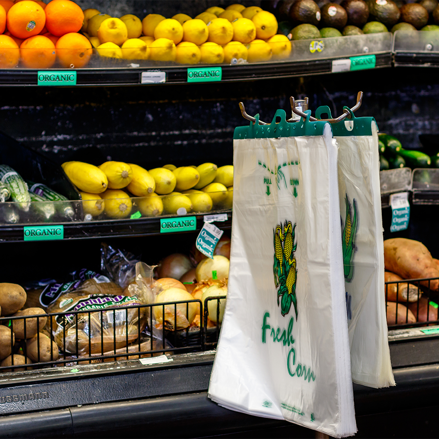 header bags in front of produce